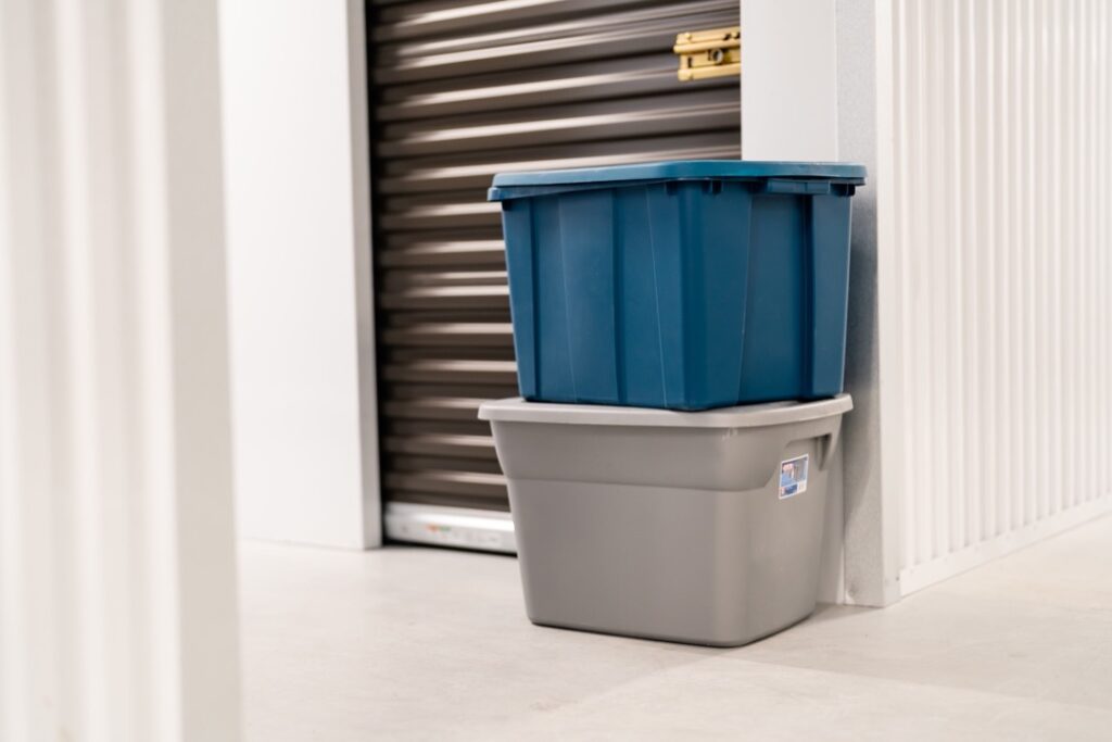 Storage bins sitting outside storage unit