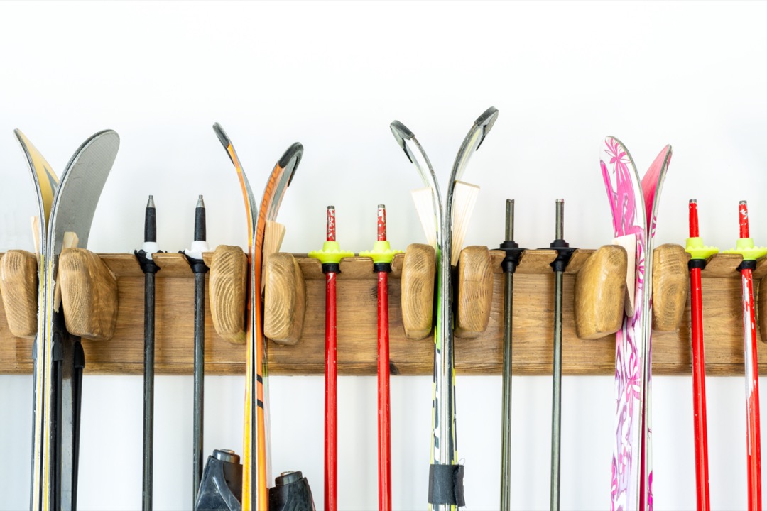 Ski equipment being stored on rack